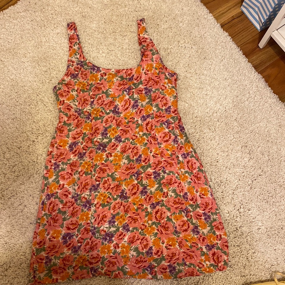 Cutest summer dress! Lightweight floral print. Smocked back